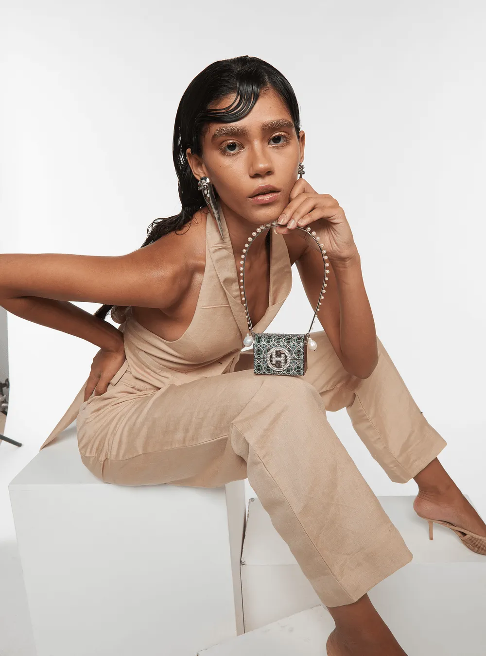 Khushnaz Ashdin Turner Wearing Pico Minaudiere Couture Bag